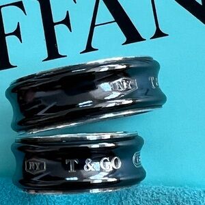 Lot of 2. Tiffany & Co. silver titanium black ring. Size 6 and size 10